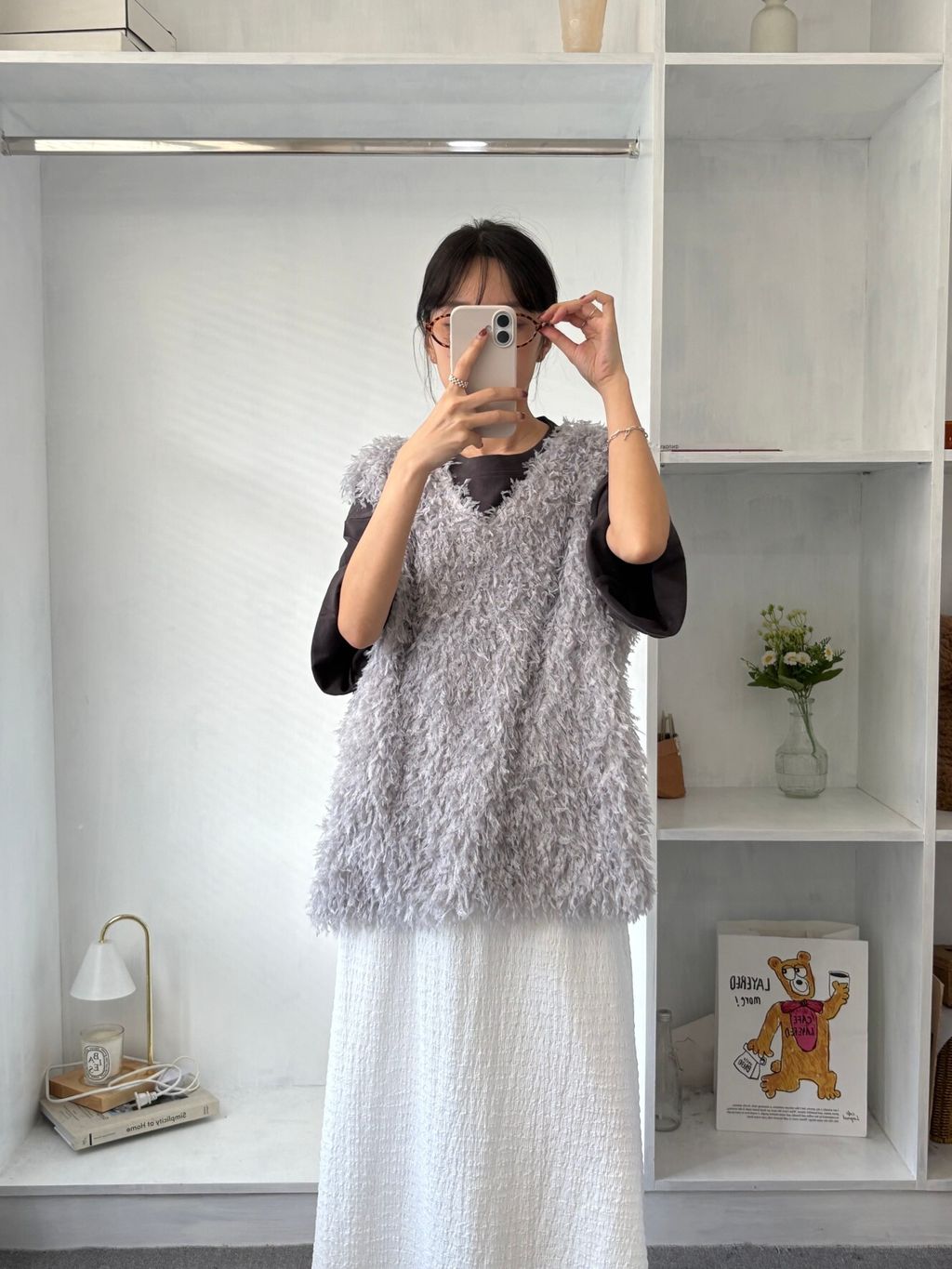 elegant-feather-vest.jpg