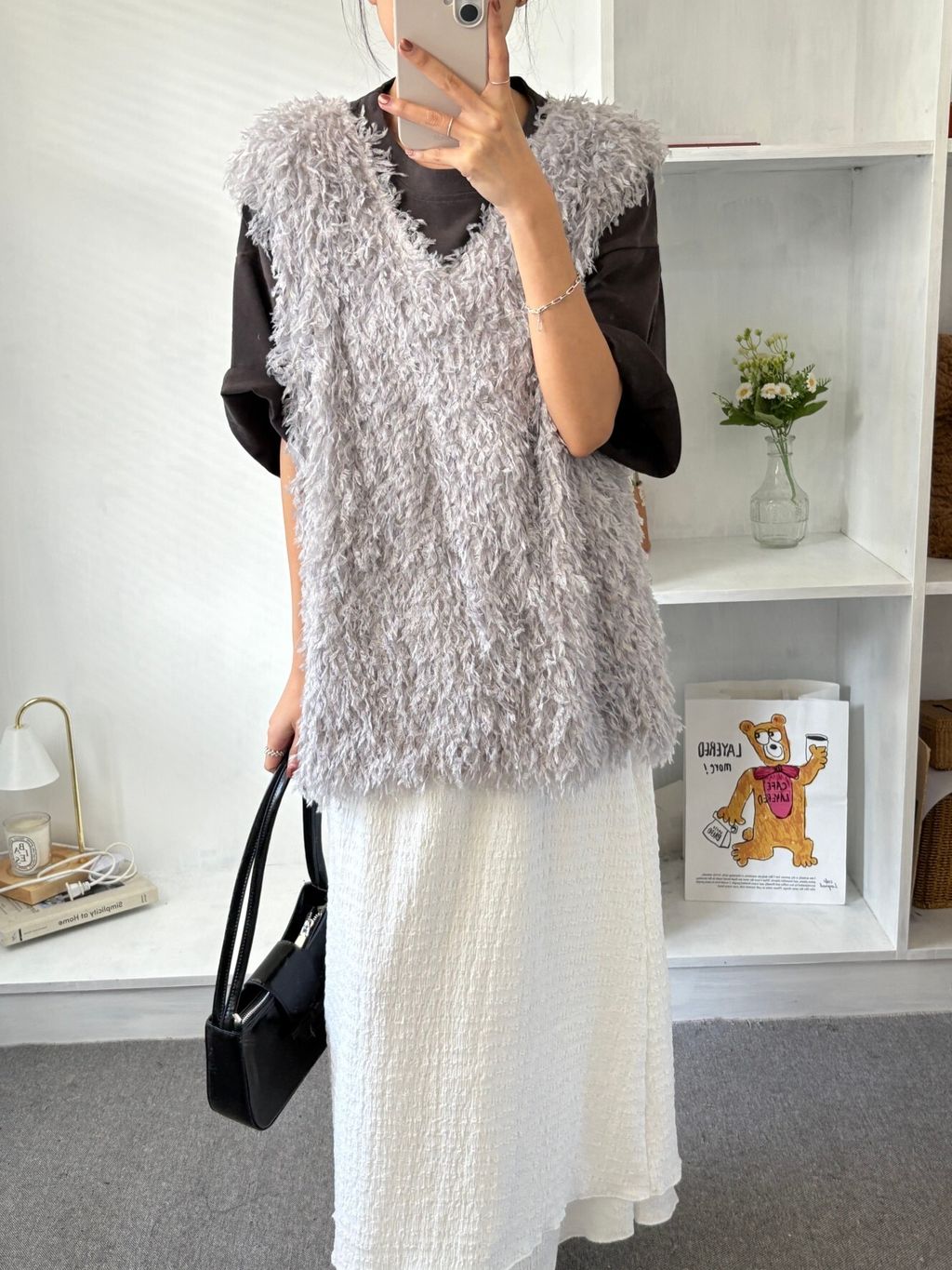 elegant-feather-vest.jpg
