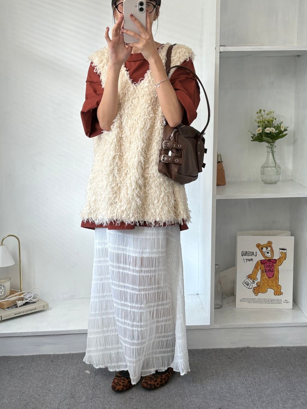 delicate-feather-layered-vest.jpg
