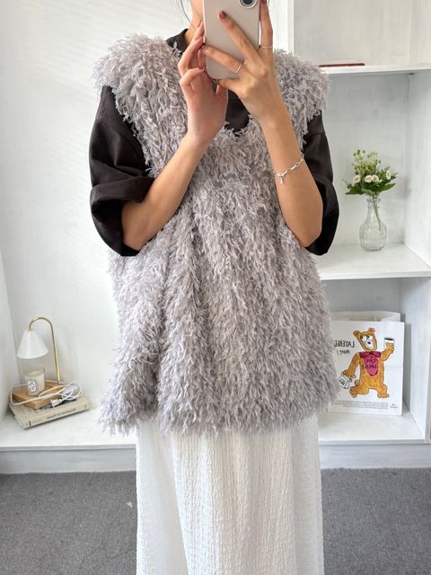feathery-flowing-vest.jpg