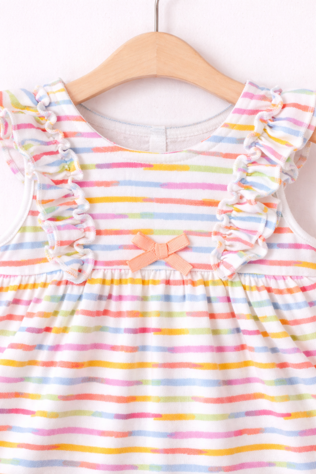 Pastel baby dress with ruffles