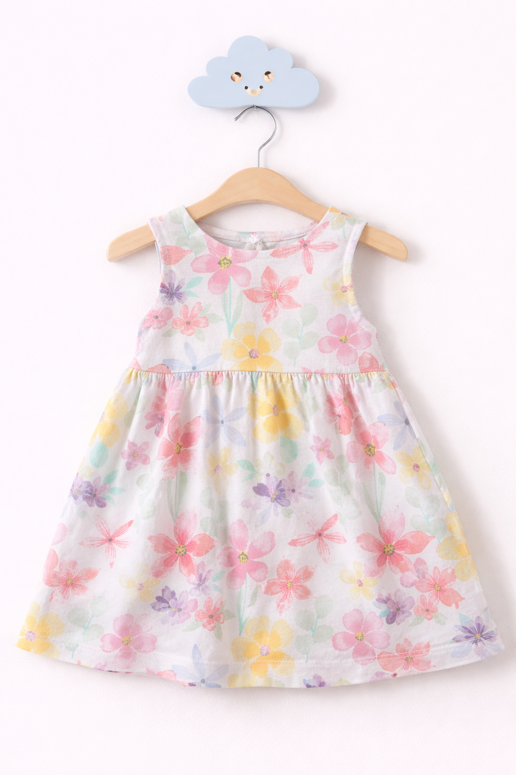 Floral sundress on wooden hanger