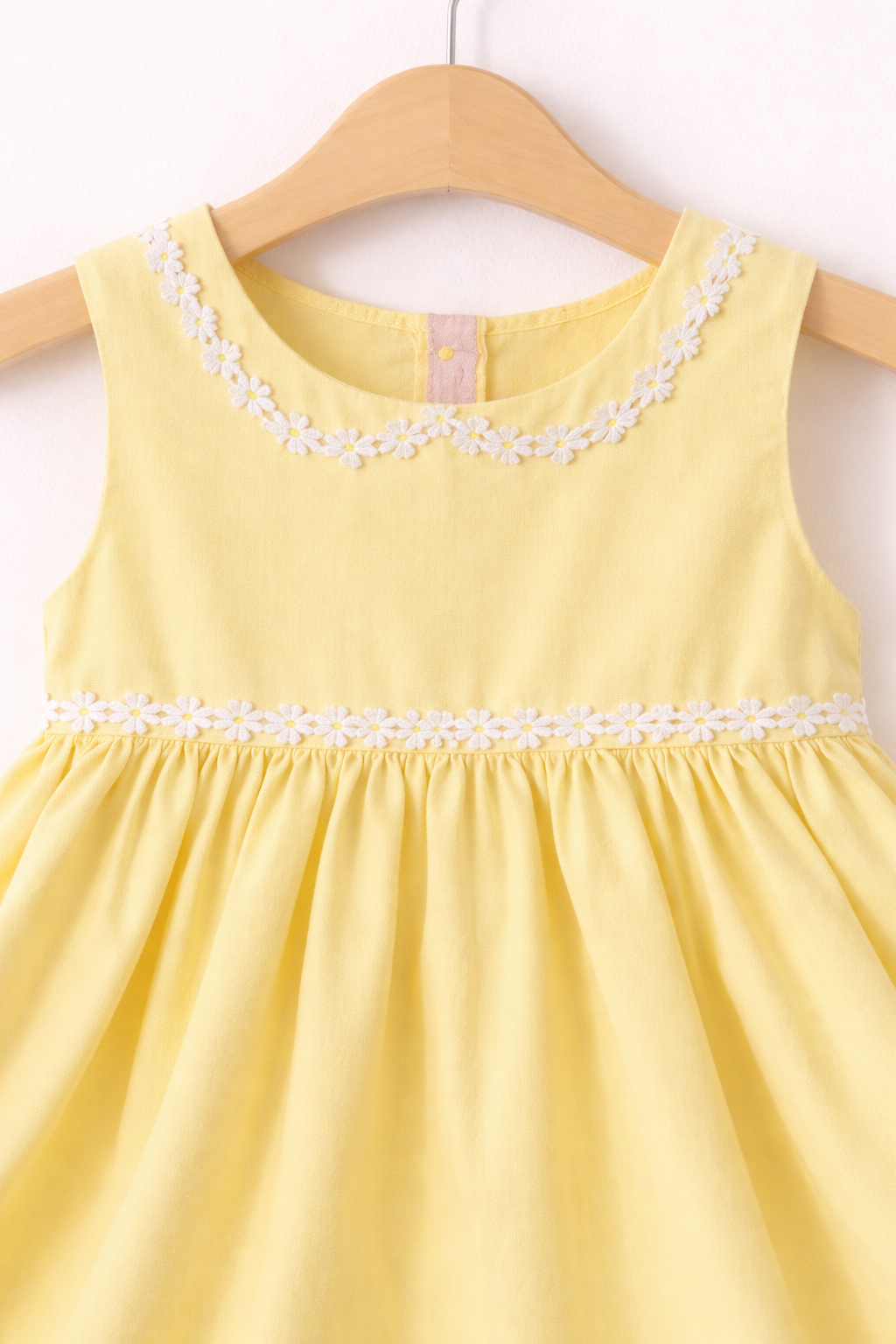Yellow dress with daisy lace details