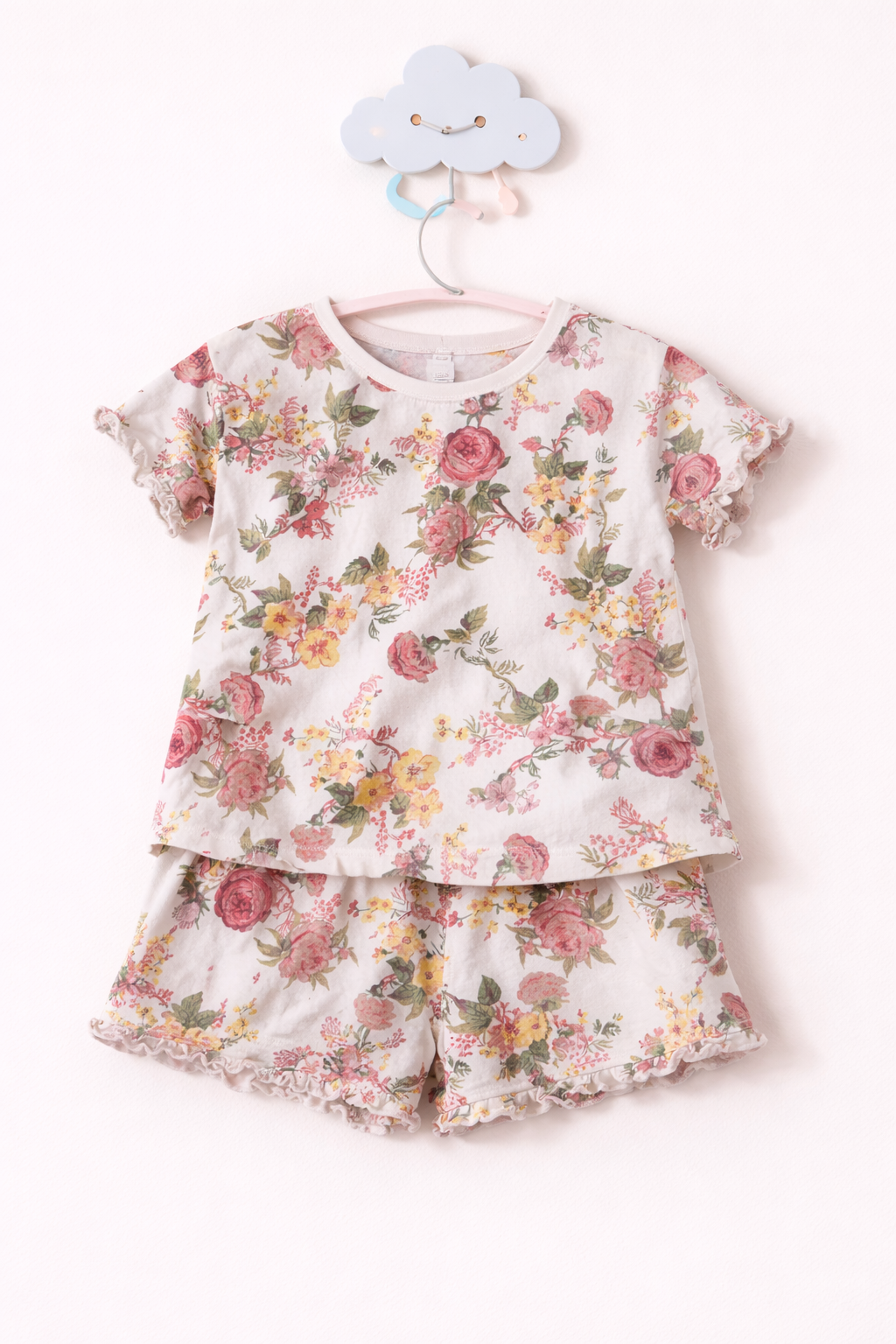 Floral girls' pajama set hanging