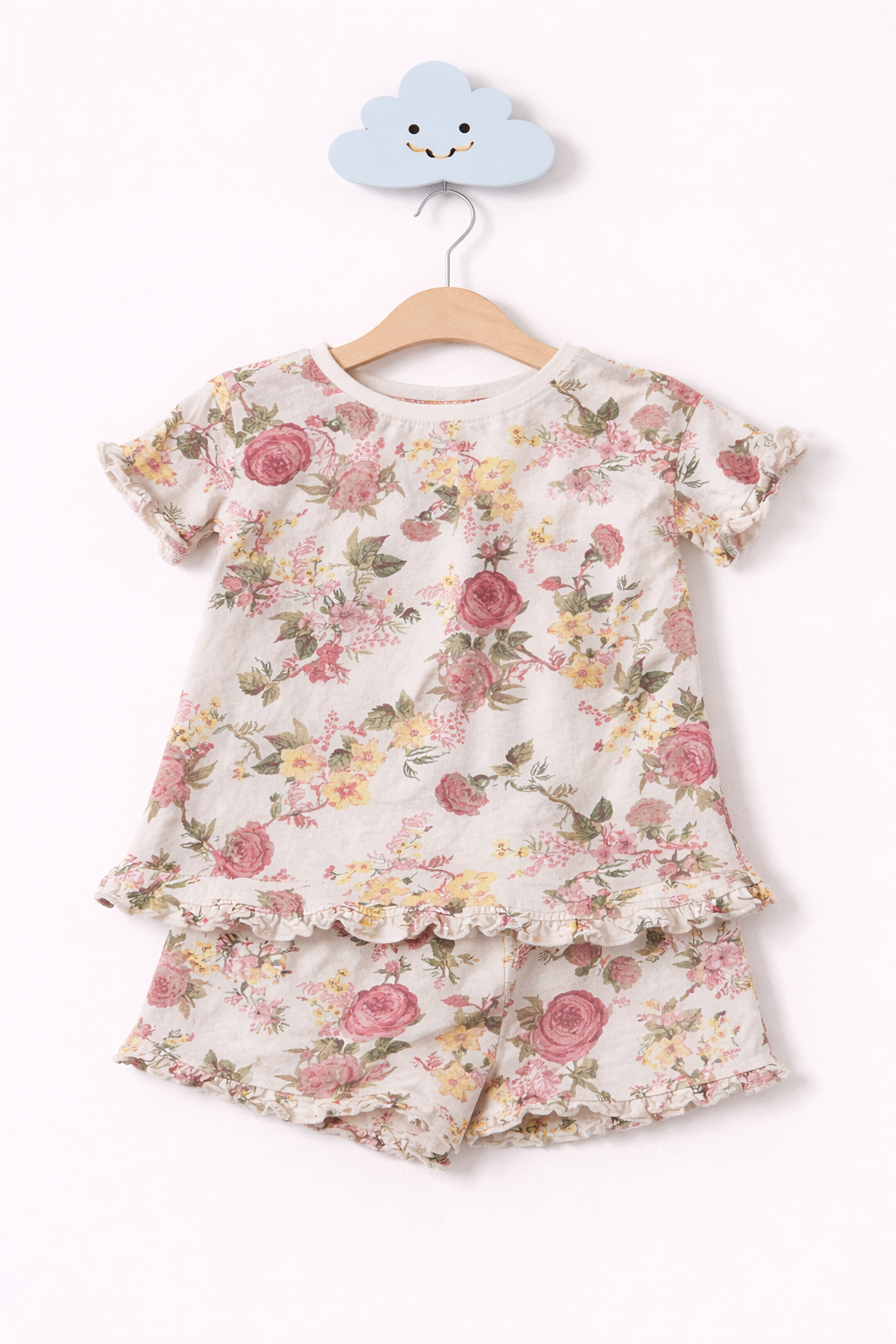 Floral girls' pajama set on hook