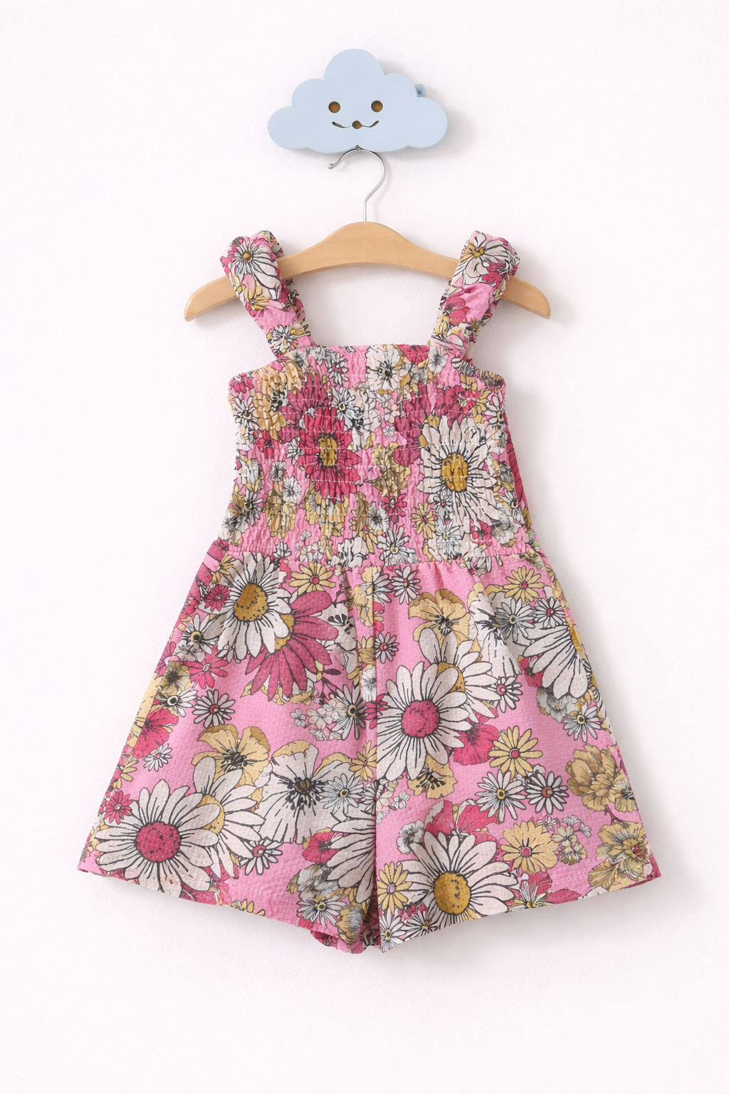 Floral summer romper on wall hook