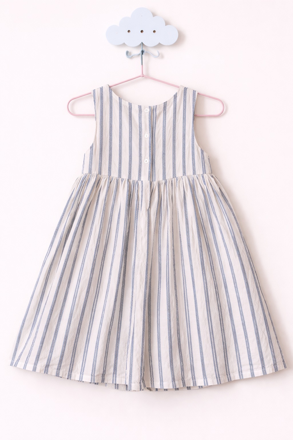 Striped dress on cloud hook