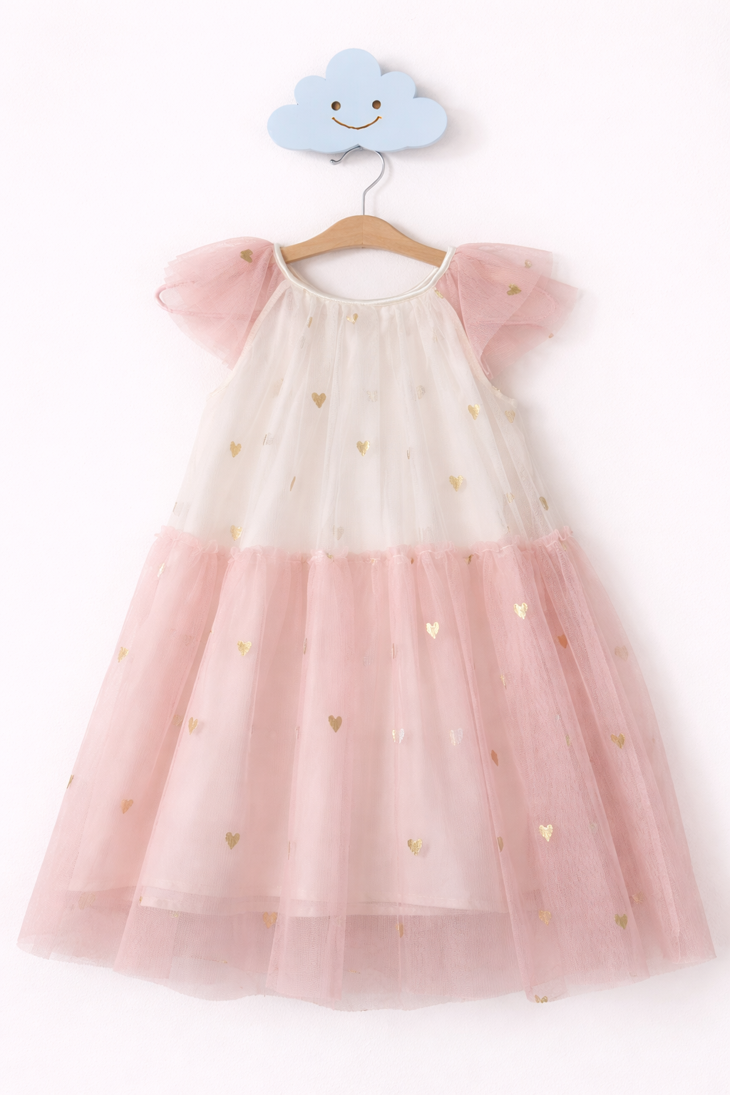 Delicate pink dress on cloud hook