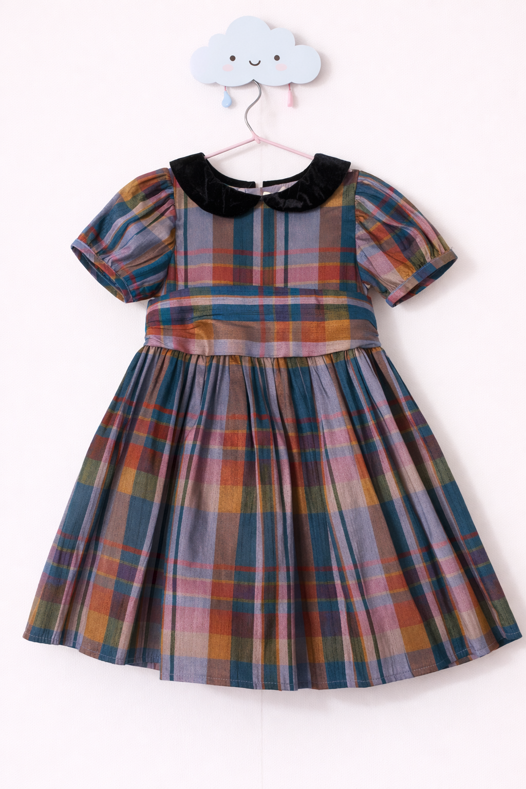 Pastel plaid dress on cloud hook