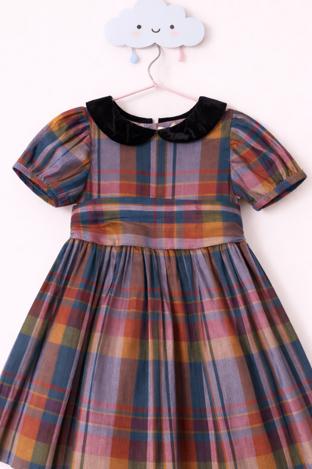 Plaid dress on cloud hook