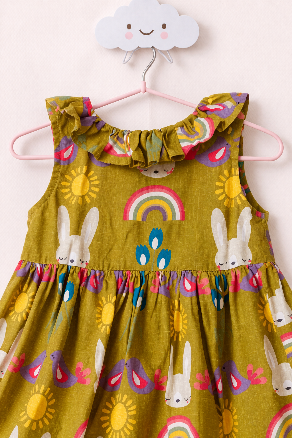 Whimsical toddler dress on cloud hook