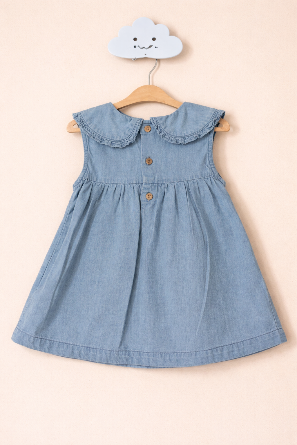 Blue chambray dress on cloud hook