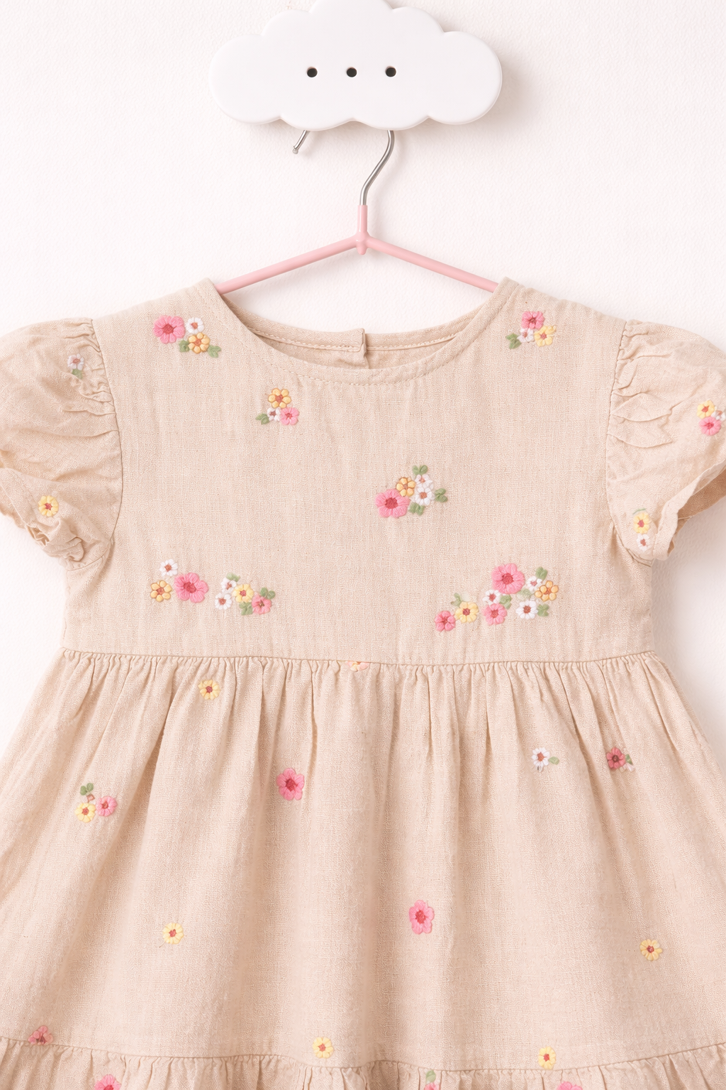Delicate floral dress on pastel hook