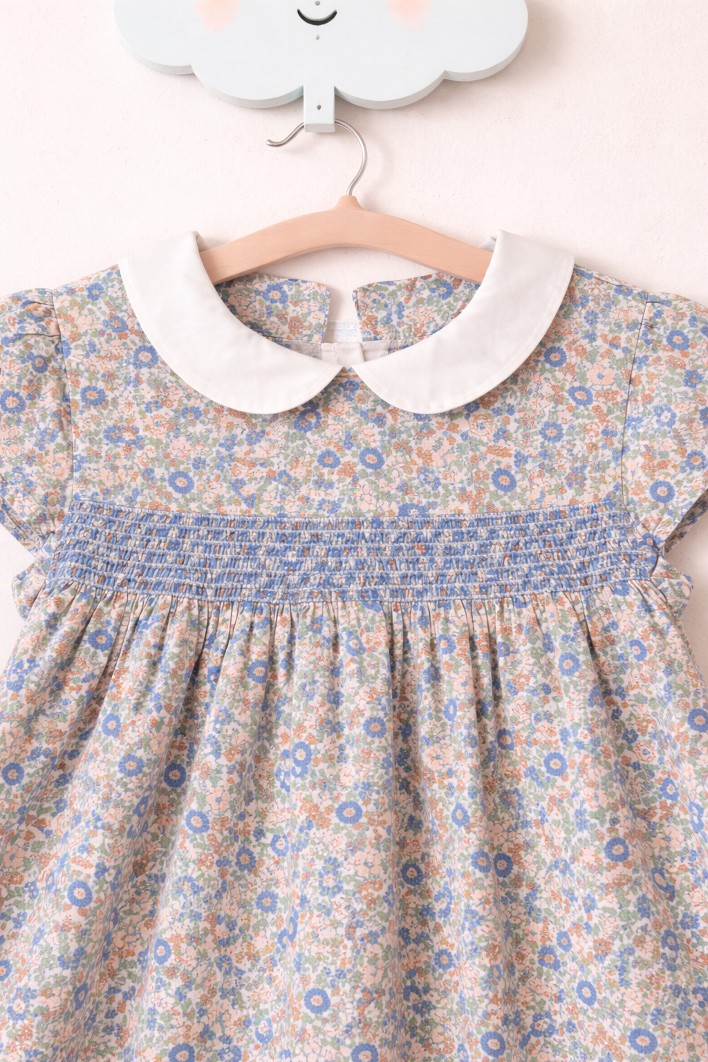 Floral smocked dress on soft hanger