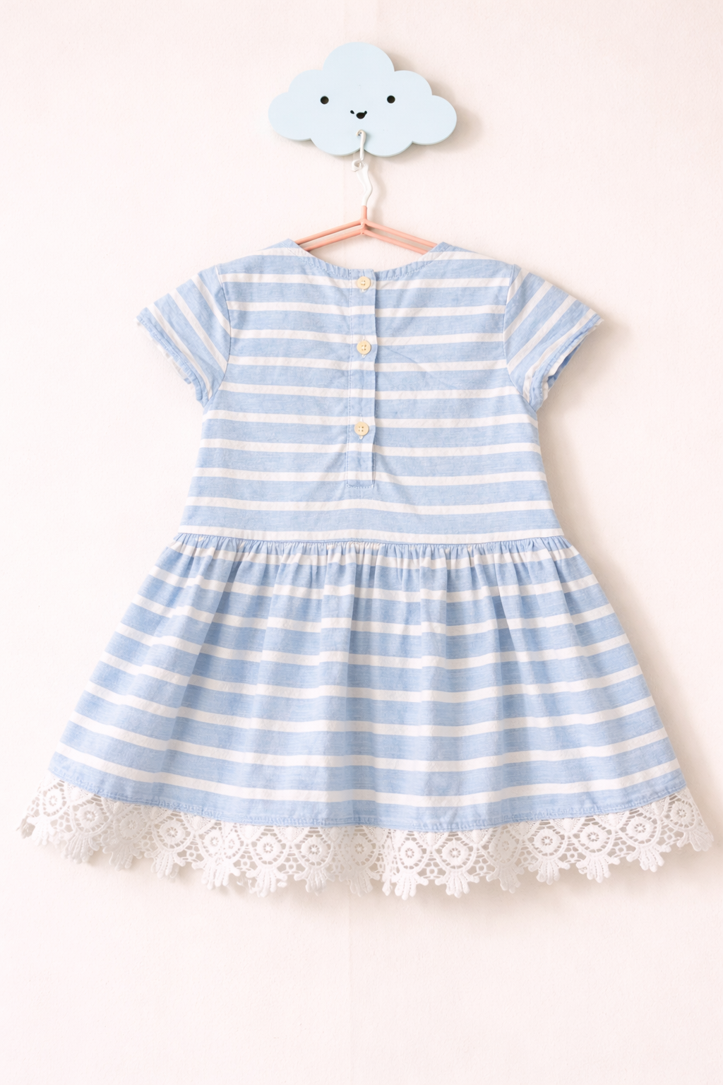 Soft striped dress on cloud hook