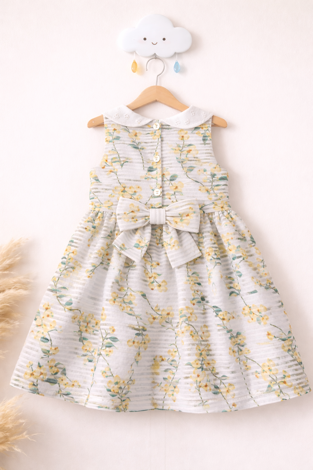 Delicate floral dress on hook