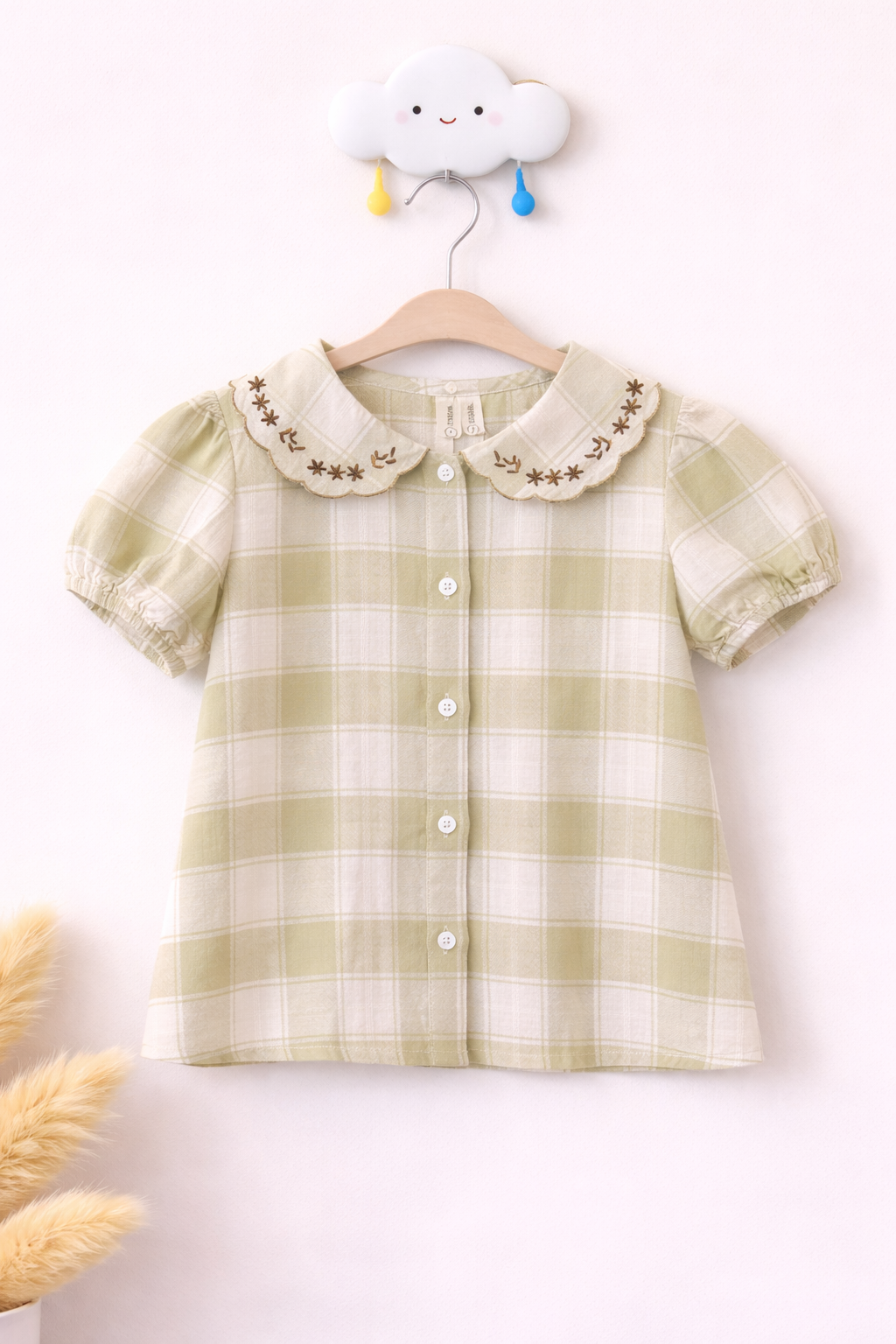 Delicate blouse on a cloud hook
