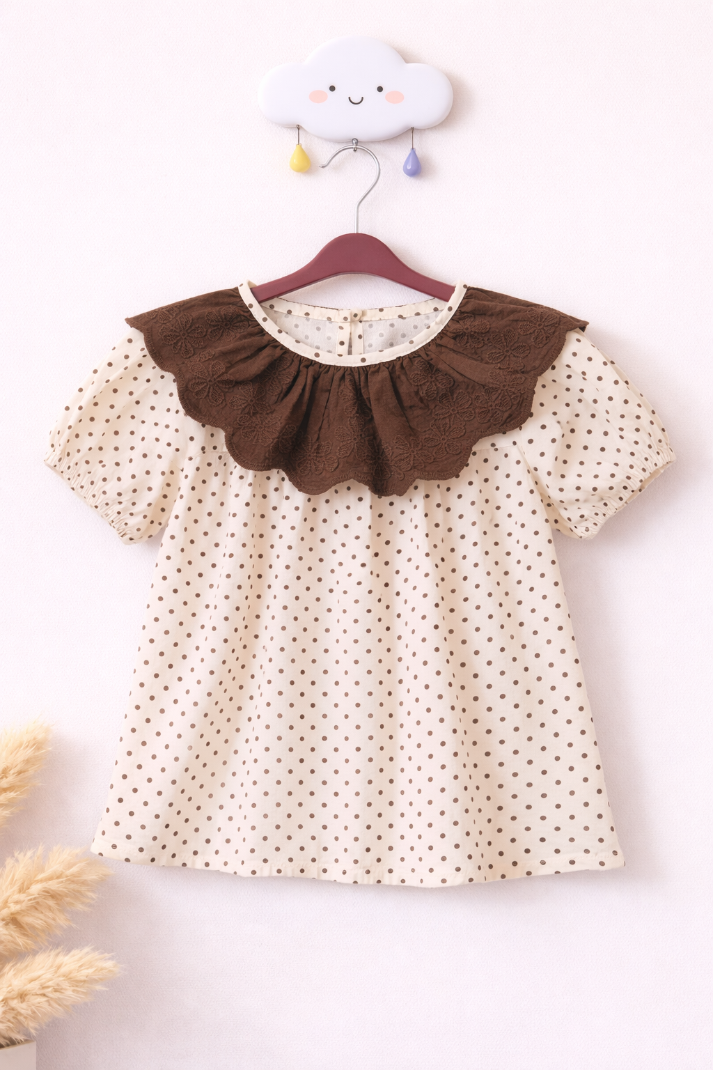 Cloud hanger with polka dot blouse
