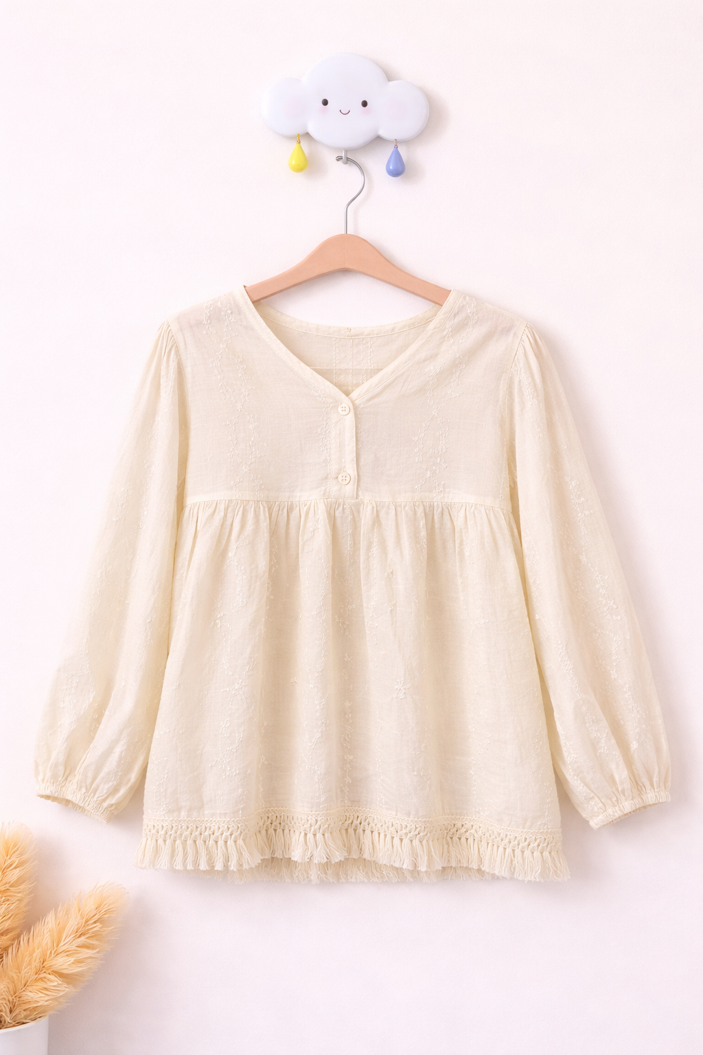 Delicate blouse on cloud hook (1)