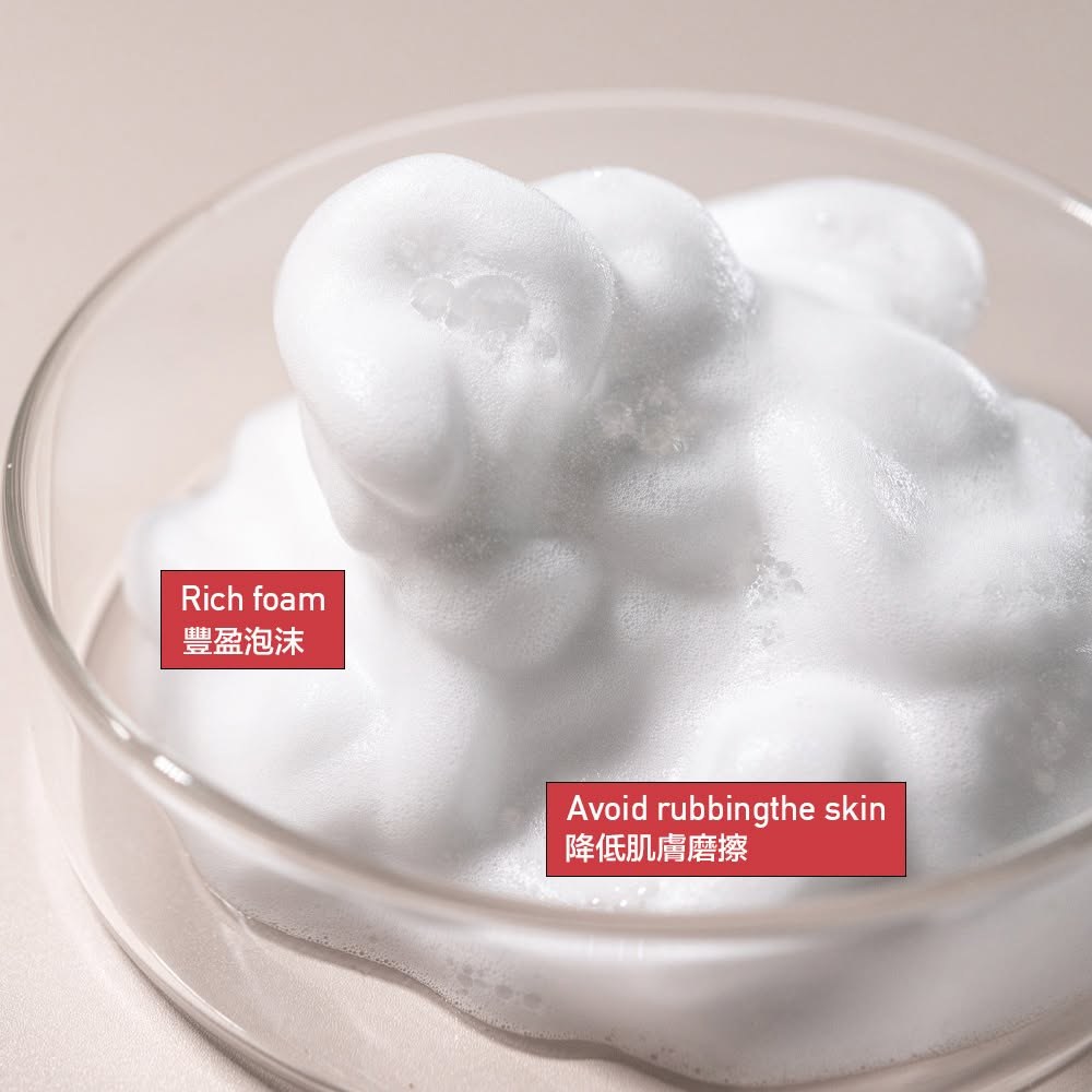 Close-up of rich, airy mousse foam in a glass bowl
