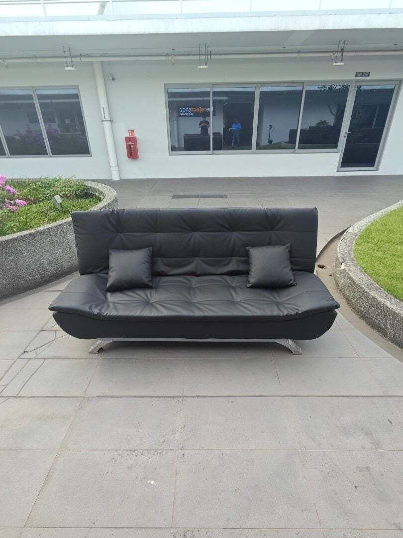 toure_sofa_bed_in_black_pu_1773841126_e53535c1_progressive