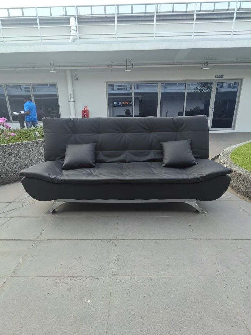 toure_sofa_bed_in_black_pu_1773841126_3c63d0dc_progressive