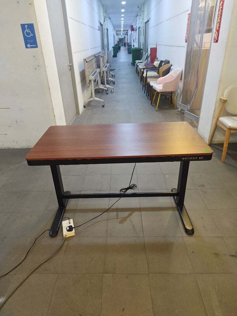 revel_electric_adjustable_tabl_1774938656_94b6aaab_progressive