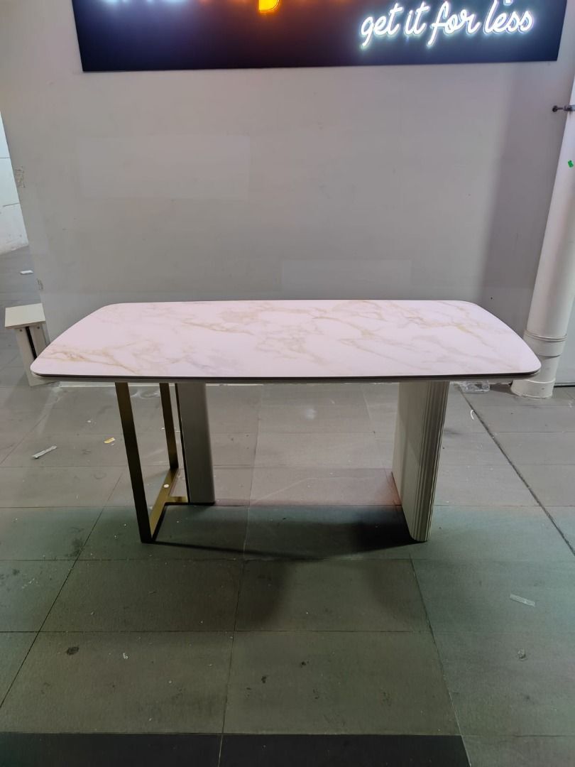 melville_dining_table_with_sin_1748330926_59c77d1f_progressive