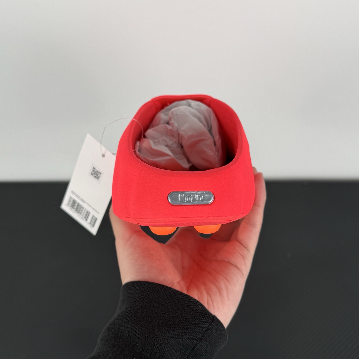 nike-mind-001-solar-red-hq4307-600-on-hand.jpg