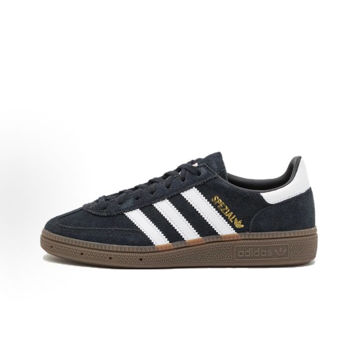 adidas Handball Spezial DB3021 Core Black premium suede upper with Cloud White leather three-stripes and vintage soft gum rubber outsole side profile view