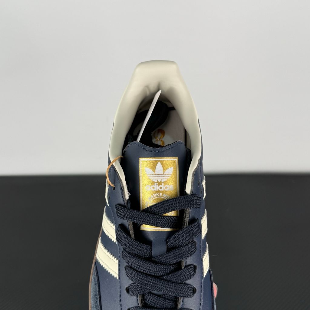 Side profile of adidas Samba OG Night Navy Gum sneaker ID2056, featuring deep navy leather, suede T-toe, cream white 3-stripes, and a gum rubber outsole. Available in Singapore and Malaysia..jpg