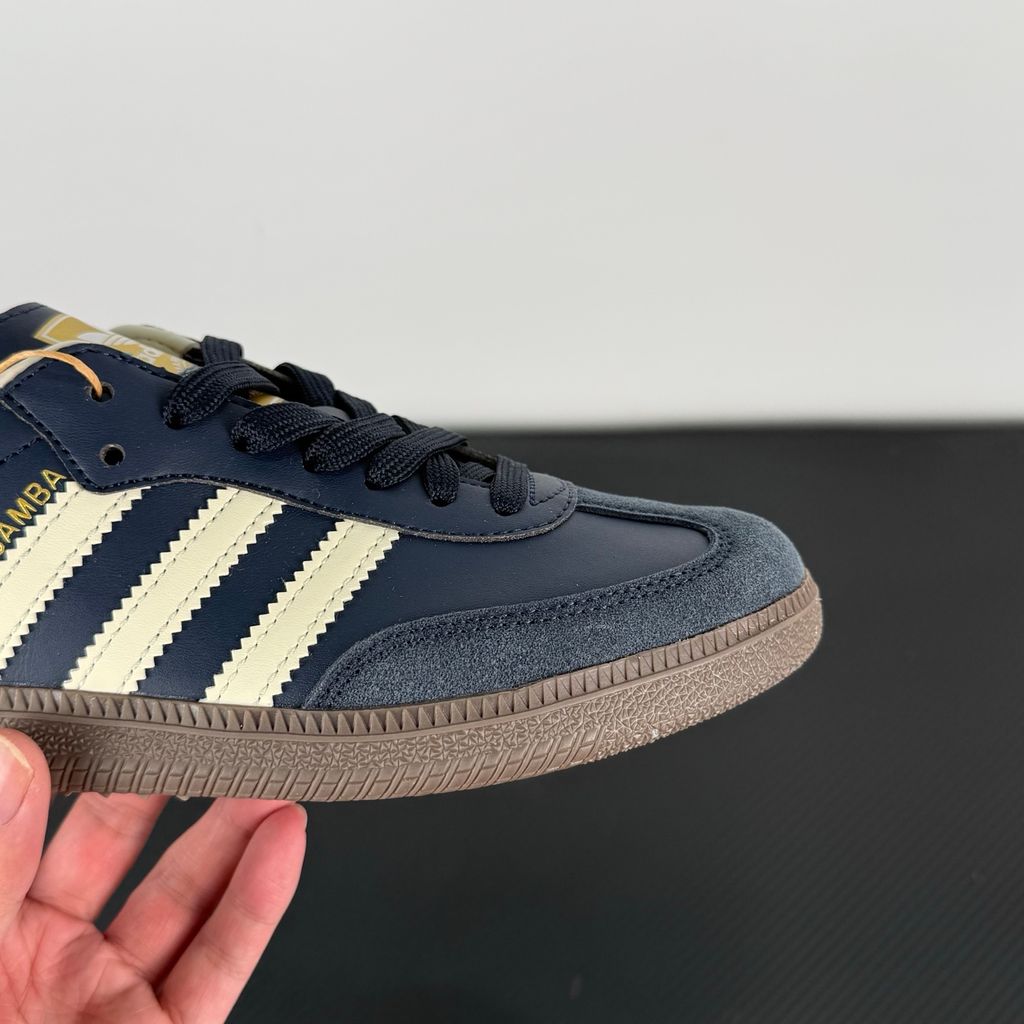 Side profile of adidas Samba OG Night Navy Gum sneaker ID2056, featuring deep navy leather, suede T-toe, cream white 3-stripes, and a gum rubber outsole. Available in Singapore and Malaysia..jpg