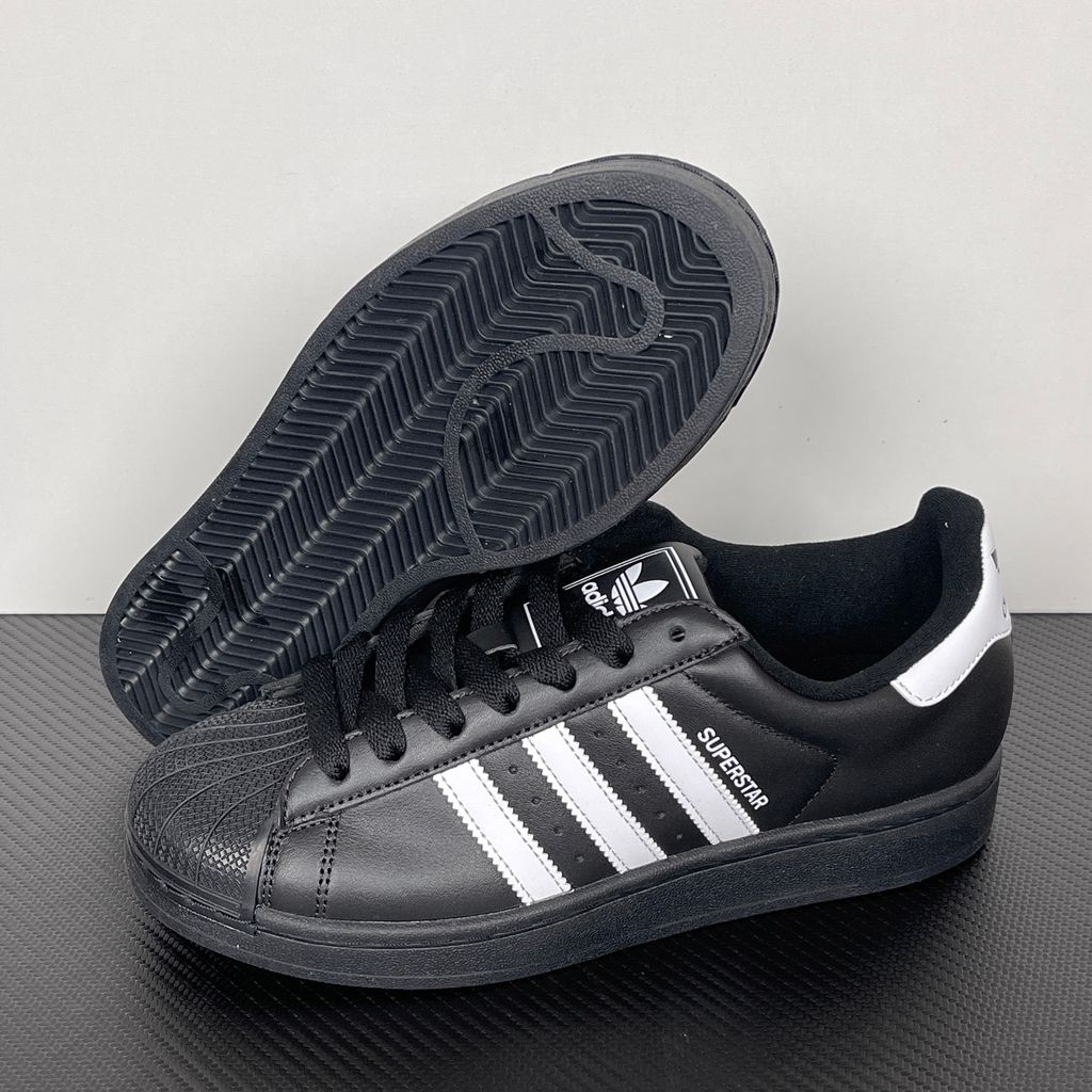 Side profile of adidas Superstar 2 Core Black Cloud White sneaker JI0079, featuring black leather, crisp white 3-stripes, and the legendary rubber shell toe. Available in Singapore and Malaysia.