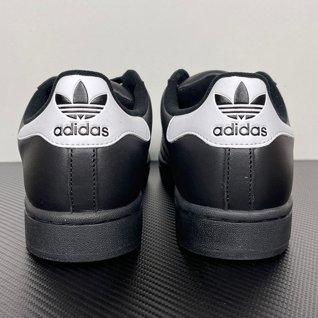 Side profile of adidas Superstar 2 Core Black Cloud White sneaker JI0079, featuring black leather, crisp white 3-stripes, and the legendary rubber shell toe. Available in Singapore and Malaysia.