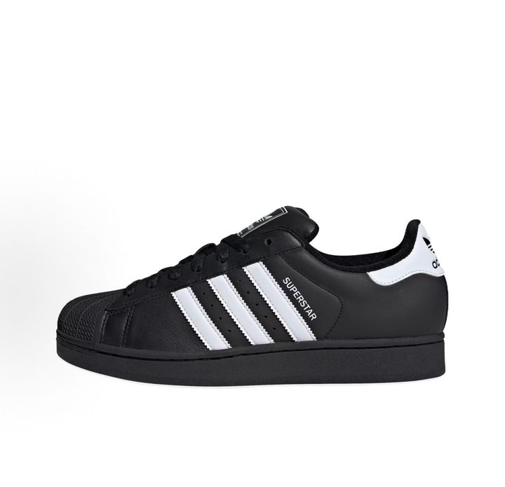 Side profile of adidas Superstar 2 Core Black Cloud White sneaker JI0079, featuring black leather, crisp white 3-stripes, and the legendary rubber shell toe. Available in Singapore and Malaysia.