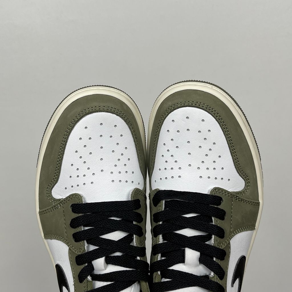 Side profile of Air Jordan 1 Retro Low OG Medium Olive sneaker HQ6998-200, featuring an olive green and summit white leather upper with a sail midsole. Available in Singapore and Malaysia..jpg