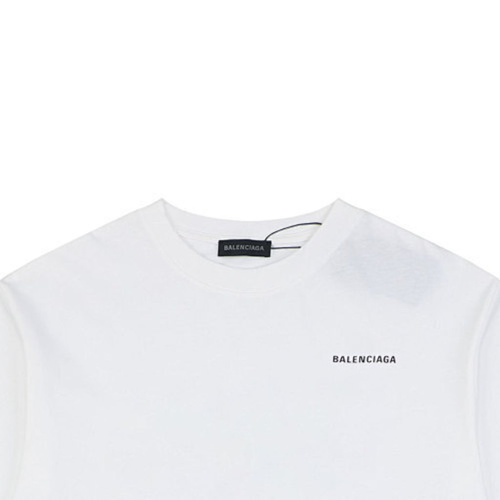 Front and back view of the Balenciaga oversized t-shirt in white, featuring a small black logo on the right chest, a large logo across the back, and a relaxed drop-shoulder fit. Available in Singapore and Malaysia.