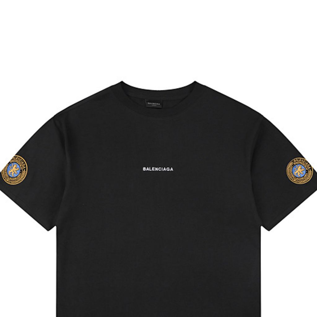 Front and back view of the Balenciaga Double Lion Emblem t-shirt in black, featuring a center chest logo, embroidered lion crests on the sleeves, and a relaxed oversized fit. Available in Singapore and Malaysia.