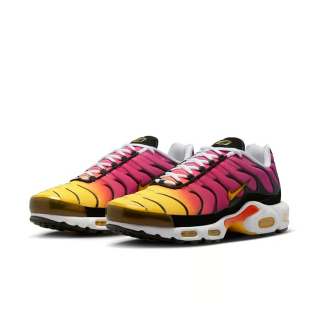 Side profile of the Nike Air Max Plus OG sneaker DX0755-600 in Raspberry Red, featuring a striking red-to-black gradient mesh upper, glossy black TPU cage, and visible Tuned Air cushioning units. Available in Singapore and Malaysia.