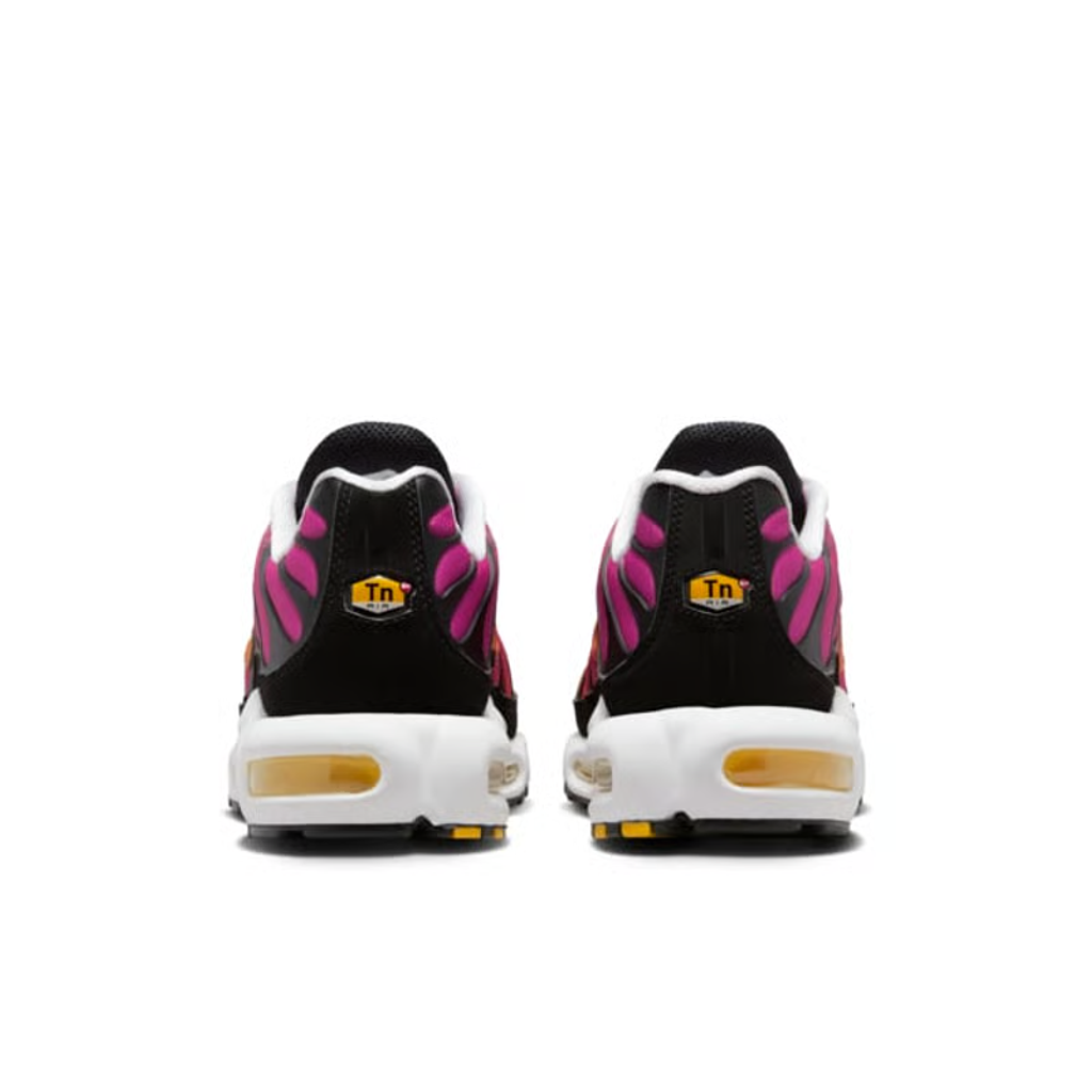 Side profile of the Nike Air Max Plus OG sneaker DX0755-600 in Raspberry Red, featuring a striking red-to-black gradient mesh upper, glossy black TPU cage, and visible Tuned Air cushioning units. Available in Singapore and Malaysia.