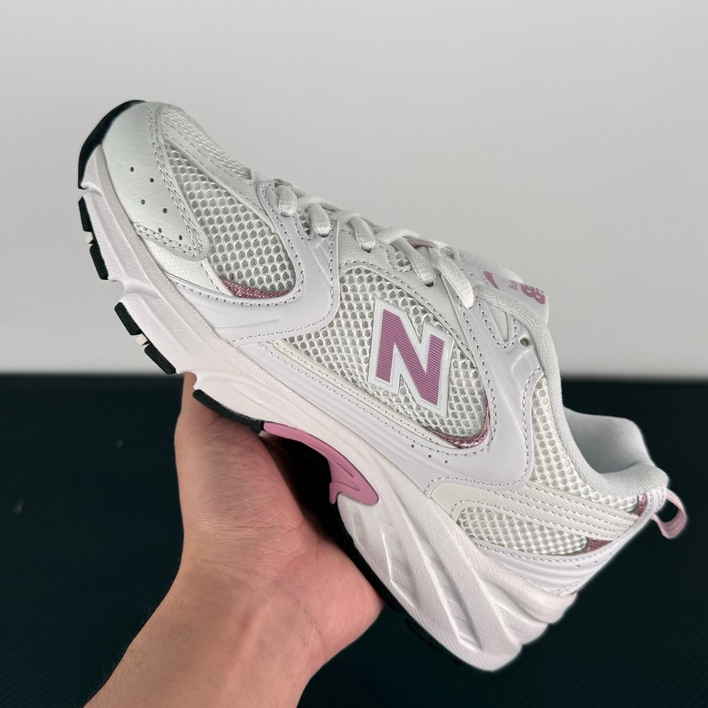 Side profile of the Nike Air Max Plus OG sneaker DX0755-600 in Raspberry Red, featuring a striking red-to-black gradient mesh upper, glossy black TPU cage, and visible Tuned Air cushioning units. Available in Singapore and Malaysia..jpg