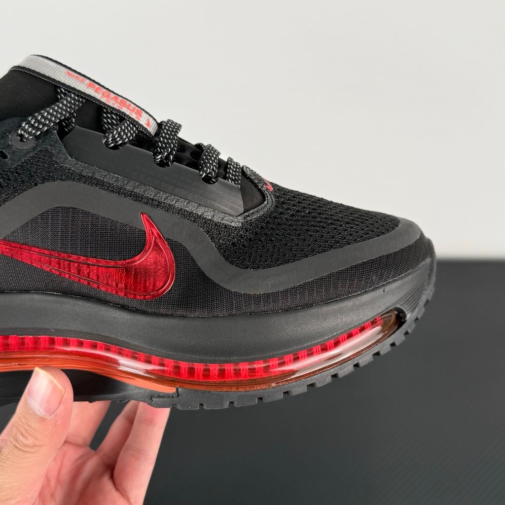 Side profile of the Nike Air Zoom Pegasus Premium running shoe HQ2593-010 in Hot Lava, featuring a vibrant red-orange knit upper, a sculpted visible Zoom Air unit, and a thick ZoomX midsole. Available in Singapore and Malaysia.