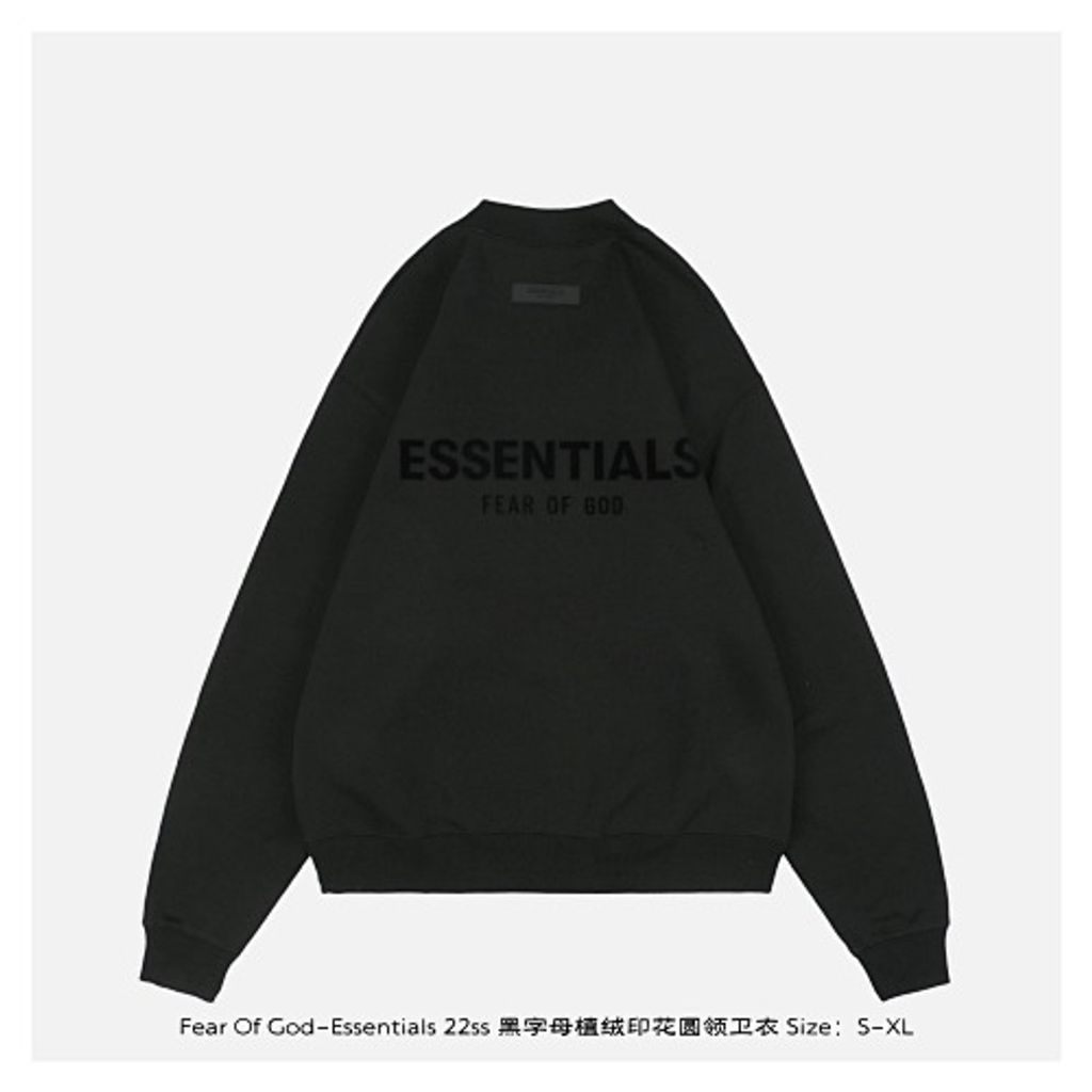Front and back view of the black Fear of God Essentials crewneck sweatshirt, featuring a tonal black flocked logo on the chest and back, with a relaxed drop-shoulder fit. Available in Singapore and Malaysia.