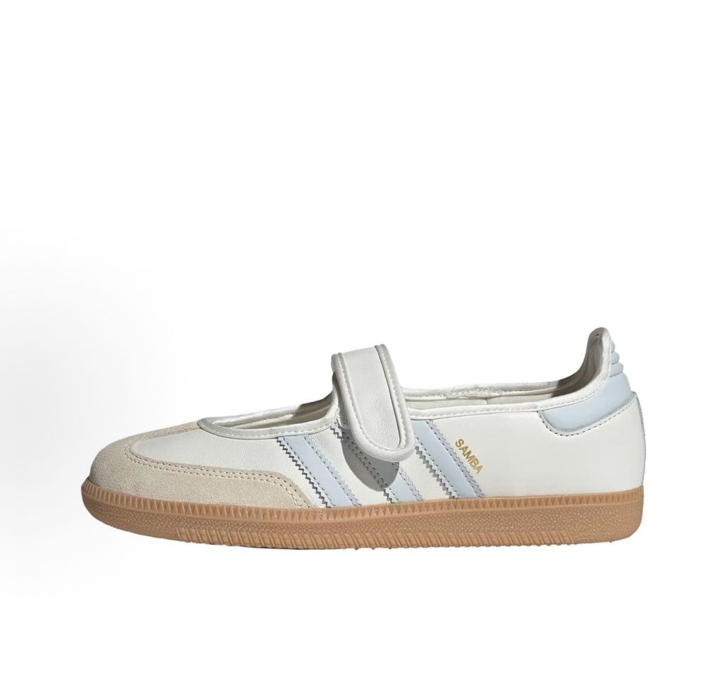 Side profile of the adidas Samba Jane White Blue Gum Women's sneaker JR7339, featuring a clean white leather upper, vibrant blue serrated 3-Stripes, an adjustable midfoot strap, and a classic gum rubber outsole. Available in Singapore and Malaysia..pic_hd