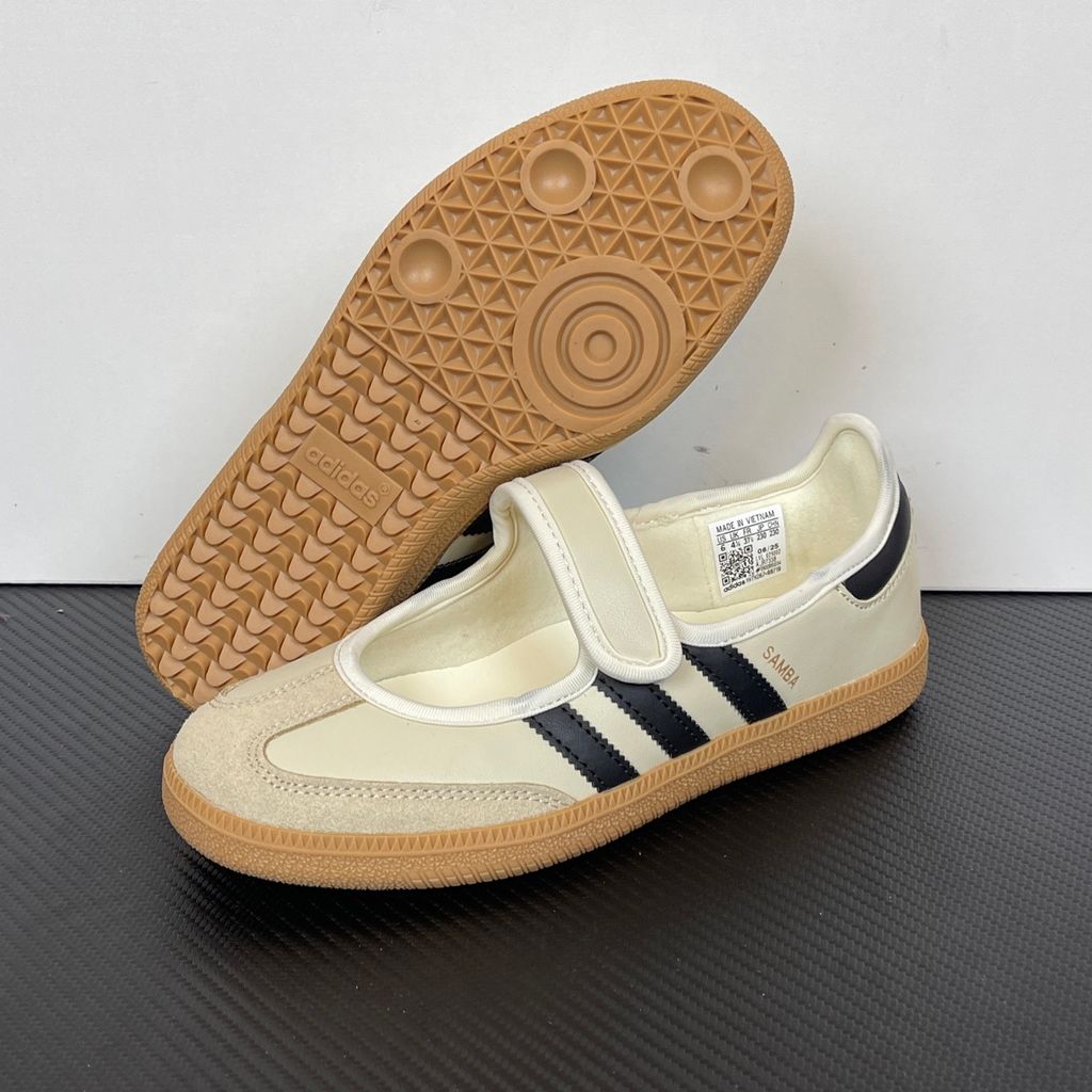 Side profile of the adidas Samba Jane Cream Black Gum Women's sneaker JR7338, featuring a soft cream leather upper, bold black serrated 3-Stripes, an adjustable midfoot strap, and a classic gum rubber outsole. Available in Singapore and Malaysia..jpg
