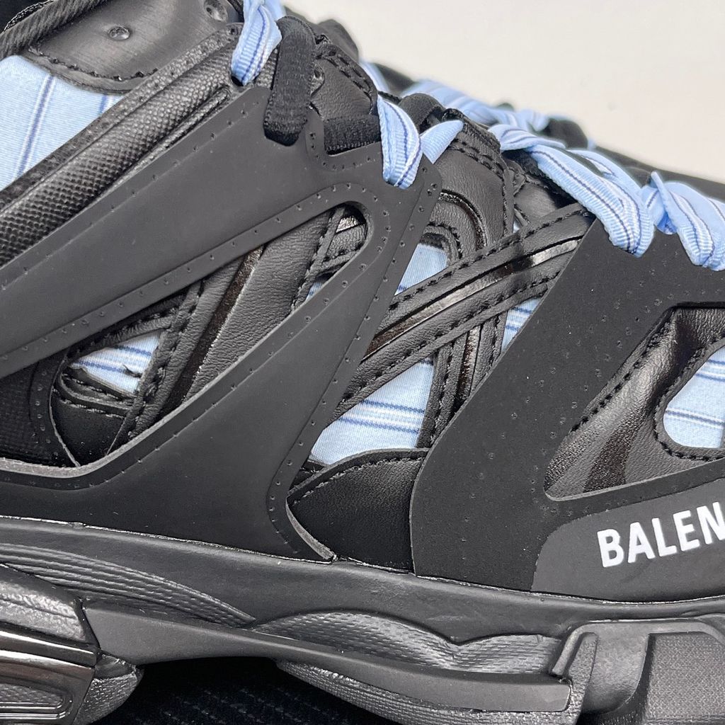 balenciaga-track-3-0-black-light-blue-striped-fabric-complex-caged-upper.jpg