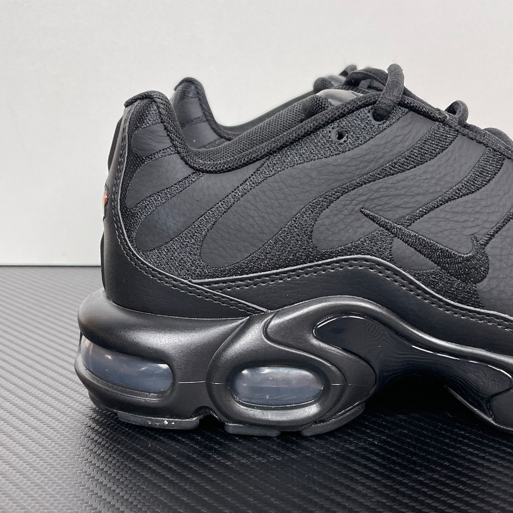 nike-air-max-plus-triple-black-leather-wavy-lines-premium-upper.jpg