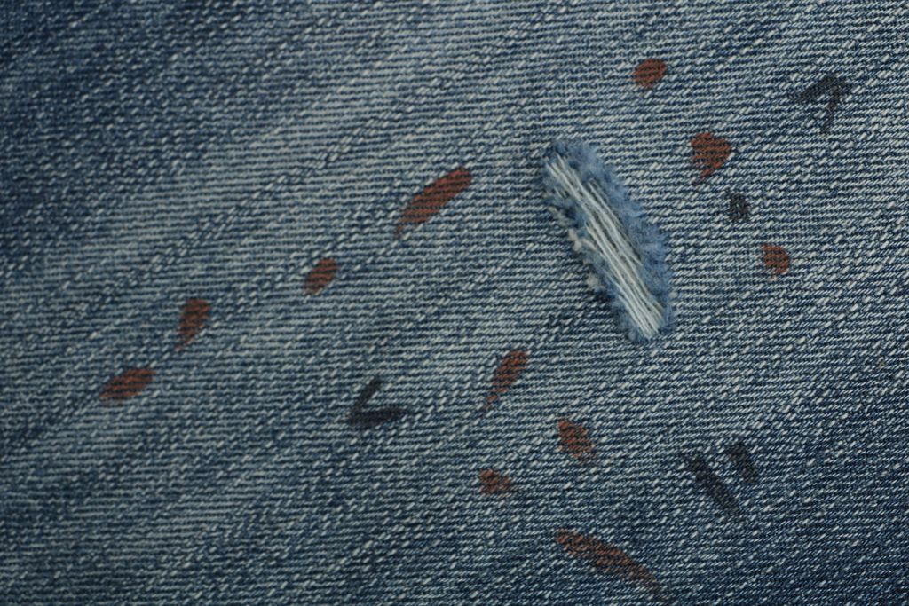 as-ink-splash-distressed-faded-ripped-denim-jeans-detail