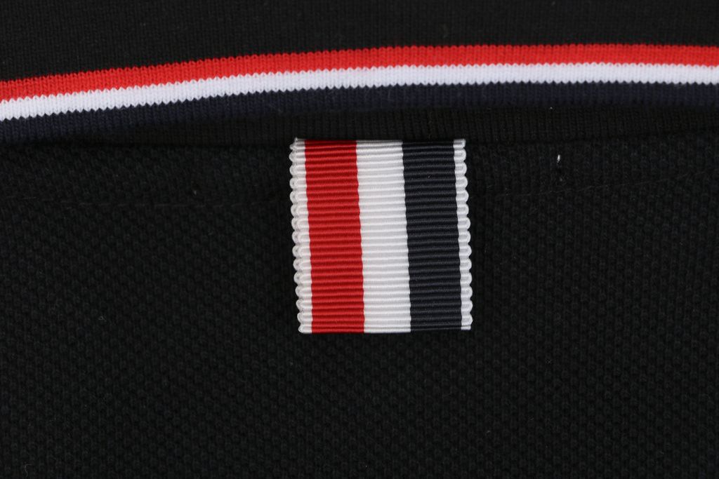 tb-t029-ribbon-ribbed-detail-black-polo-tshirt