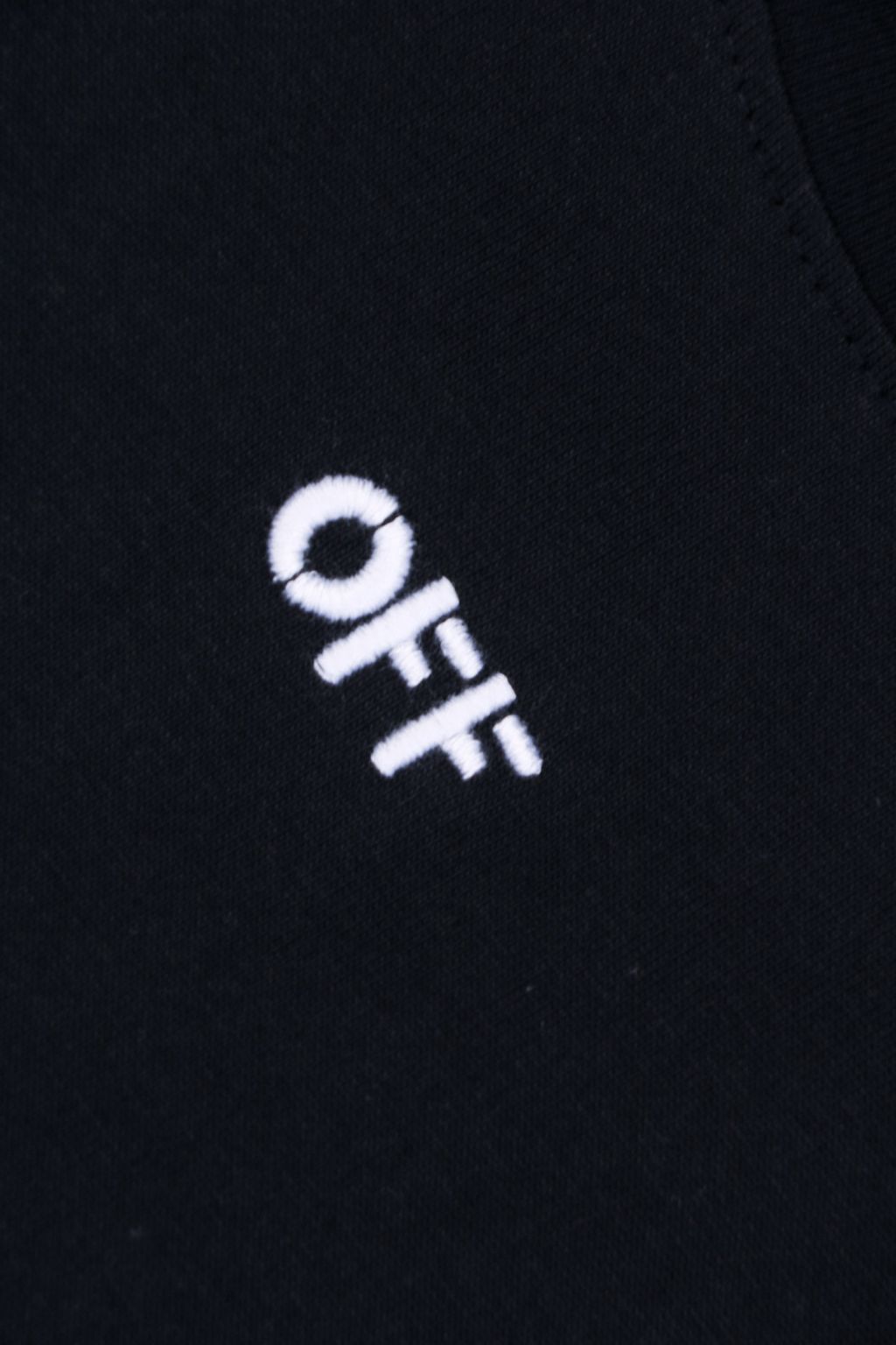ow-tonal-anchor-arrow-120000-stitch-imported-embroidery-woven-label-detail